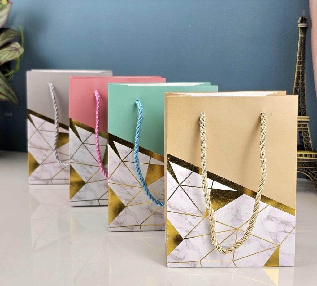 SATYAM KRAFT 4 Pcs Paper Gift Bags with Handles | Gift for Her/Him, Mothers Day Gifting,Gift Bags,Wedding Return Gifts, Birthday, Shopping & Party | Eco-Friendly Reusable (12 x 16 cm) (Multicolor)